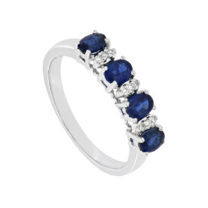 Anillo uñas de oro blanco con diamantes y zafiros