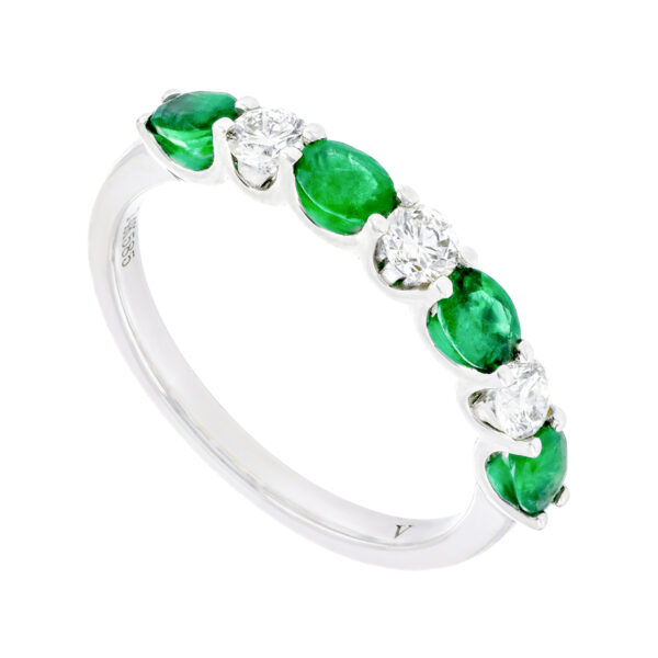 Anillo de oro blanco con esmeraldas y diamantes