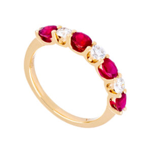 Churumbela de oro amarillo con rubíes y diamantes