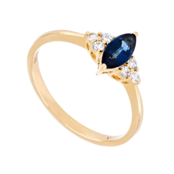 Anillo de oro amarillo de 14kts con zafiro y diamantes