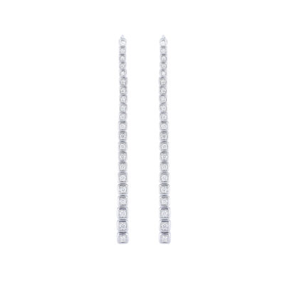 Aretes largos de oro blanco con diamantes