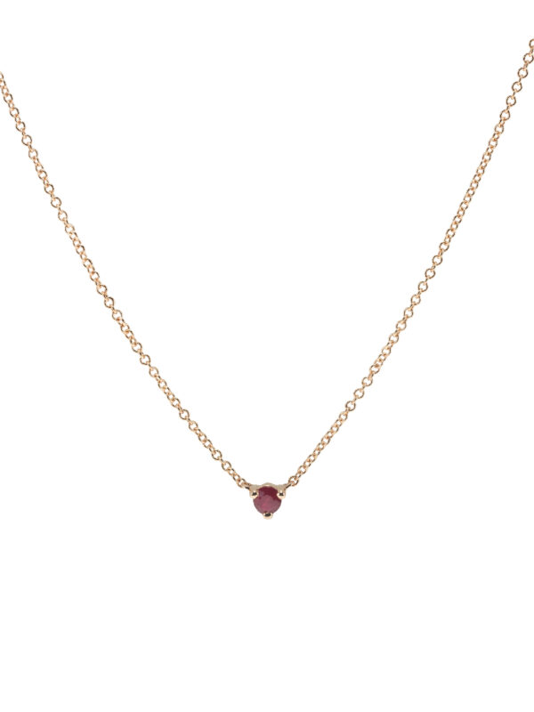Dije de oro rosa con rubí