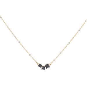 Dije mini de oro amarillo con diamantes negros