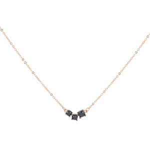 Dije mini de oro rosa con diamantes negros