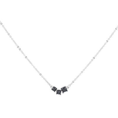 Dije mini de oro blanco con diamantes negros