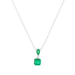 Dije de oro blanco con esmeralda y diamantes
