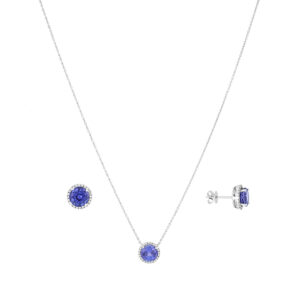 Juego de broquel con dije en oro blanco con tanzanita y diamantes